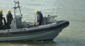 Boat with capture claw